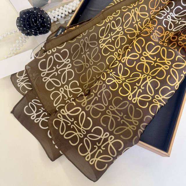 New Arrival! This new silk satin long scarf is truly breathtaking! The effect wh