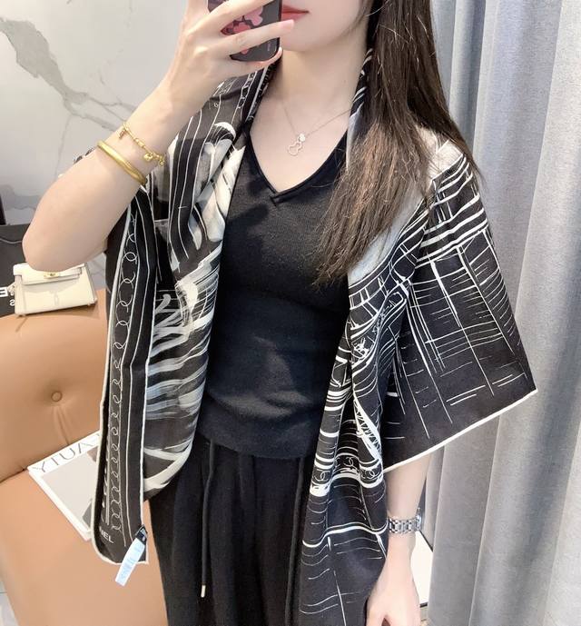 Chanel New Arrival! A Chanel scarf with a touch of pink, classic camellia and el