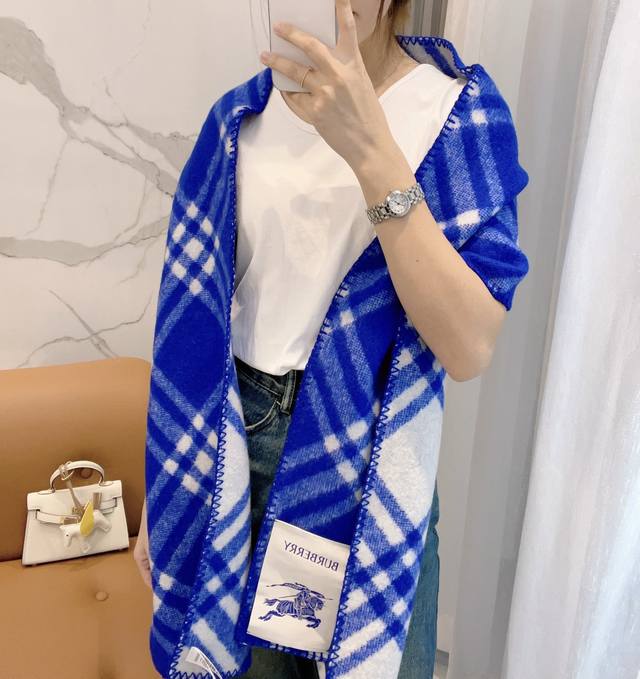 This Burberry scarf is an absolute must-have, a truly exclusive piece. The craft