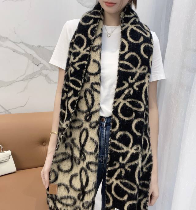 Loewe's gorgeous new alpaca wool Anagram scarf with a milk tea style