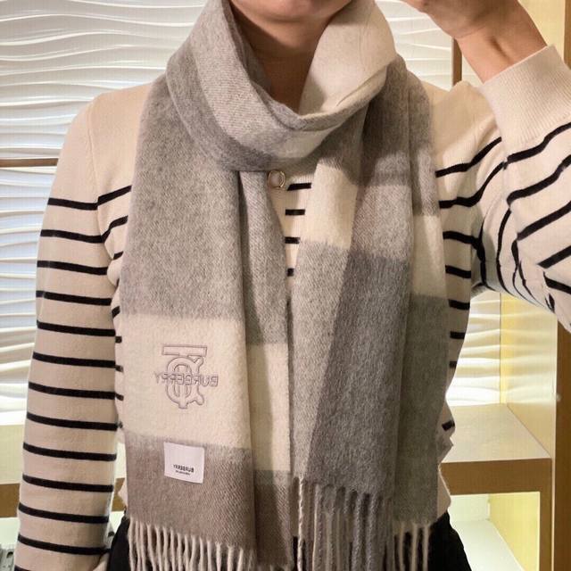 Burberry. Highly recommended men's and women's scarves! A rare find