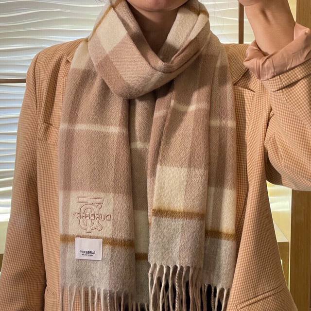 Burberry. Highly recommended men's and women's scarves! A rare find