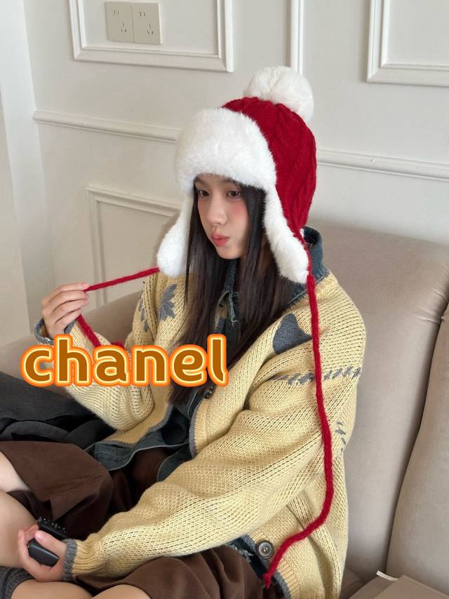 Chanel plush earflap hat with classic double C logo design. The hat body is made