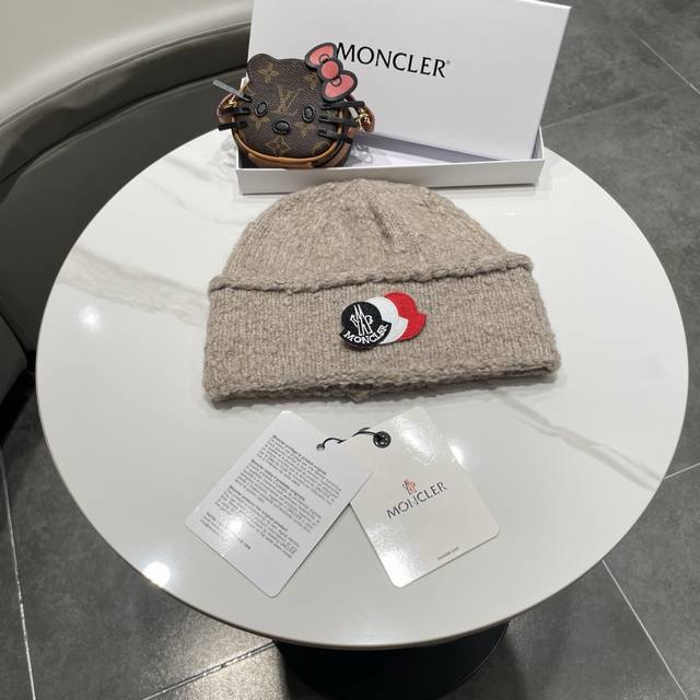 Moncler knitted beanie is incredibly soft and comfortable, warm yet stylish, sim