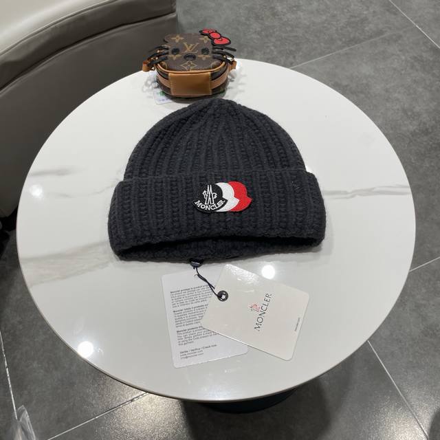 Moncler knitted beanie, comes with QR code. High-quality, sophisticated, and inc