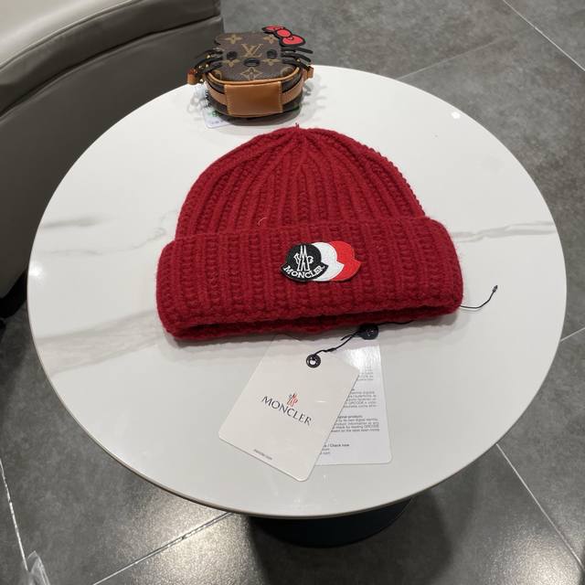 Moncler knitted beanie, comes with QR code. High-quality, sophisticated, and inc