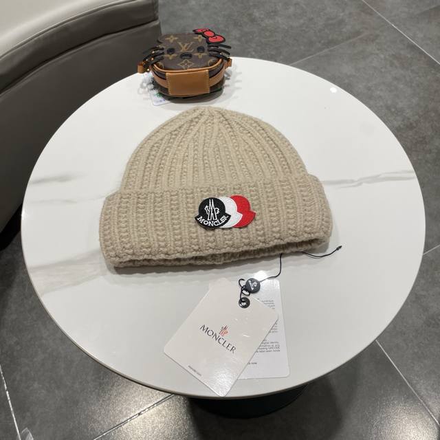 Moncler knitted beanie, comes with QR code. High-quality, sophisticated, and inc