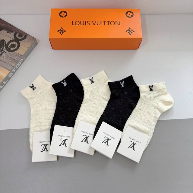 A box of 5 pairs of Louis Vuitton (LV) socks with packaging. Made of bamboo cott