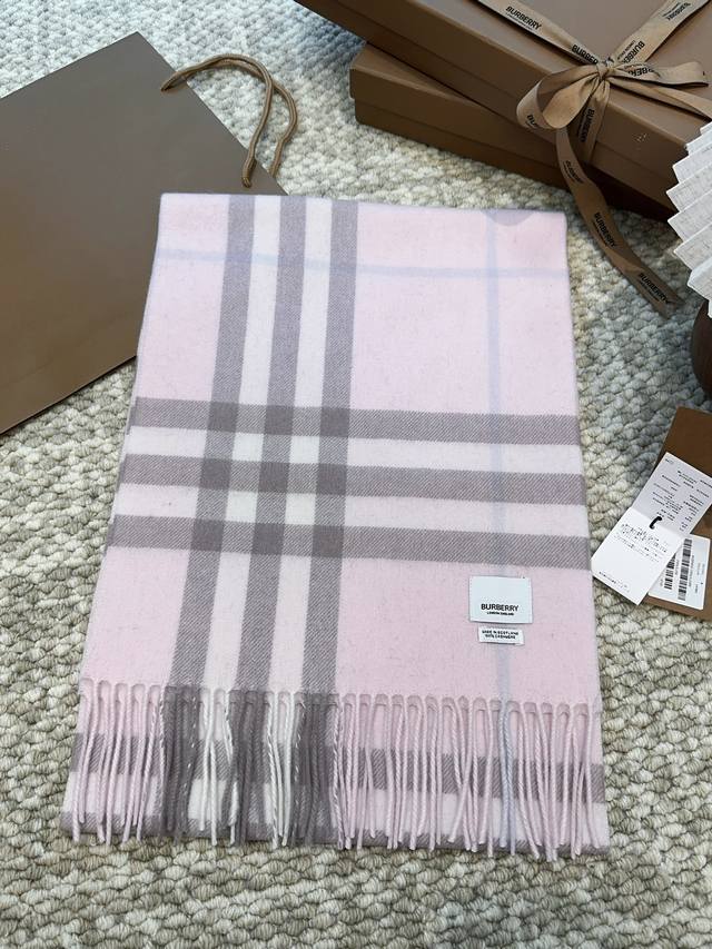 This is Burberry's most classic cashmere check scarf. It completely outclasses a