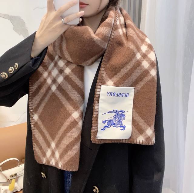 This Burberry scarf is an absolute must-have, a truly exclusive piece. The craft