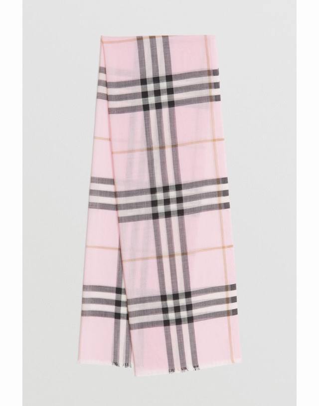 Burberry. Burberry's new retro check pattern, a limited-edition show piece. The