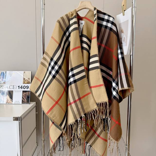 New Burberry cape coat, a finely crafted Scottish shawl made from a soft wool-c