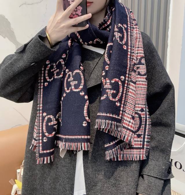 Gucci's classic GG pattern is one of the brand's iconic elements, first used in