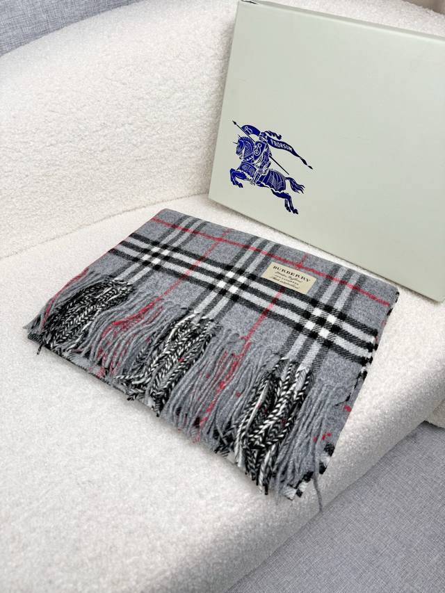 Burberry. A timeless classic Burberry check shawl with unparalleled quality and