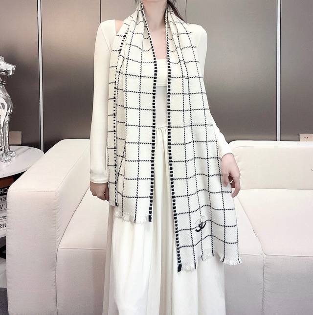 Chanel VIP Exclusive - Top-grade Scottish cashmere. The textured weave gives thi