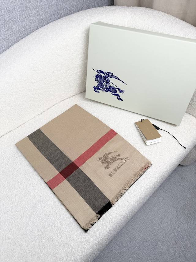 B Brand. A classic camel-colored, timelessly stylish Burberry classic check thin