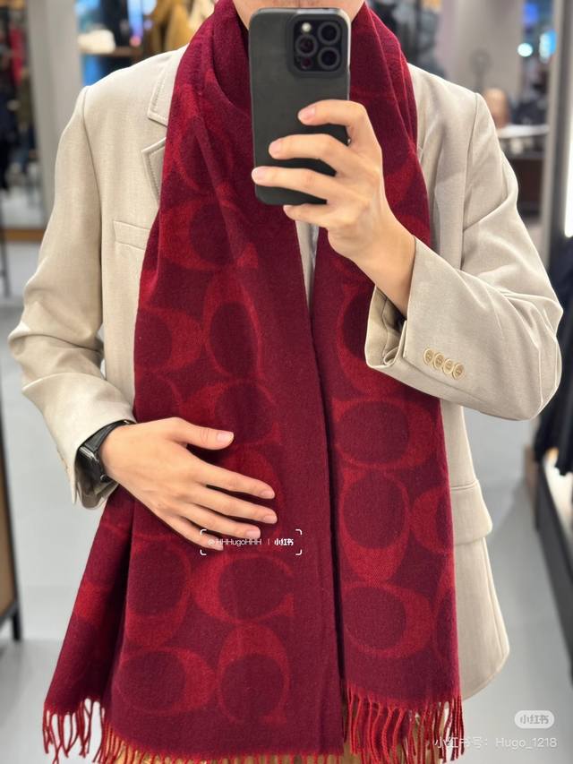 This classic Coach scarf is so beautiful! Not only is it stylish, but it's also