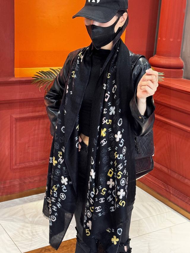 Chanel's classic design is elegant and sophisticated. A perfect scarf to wear ar