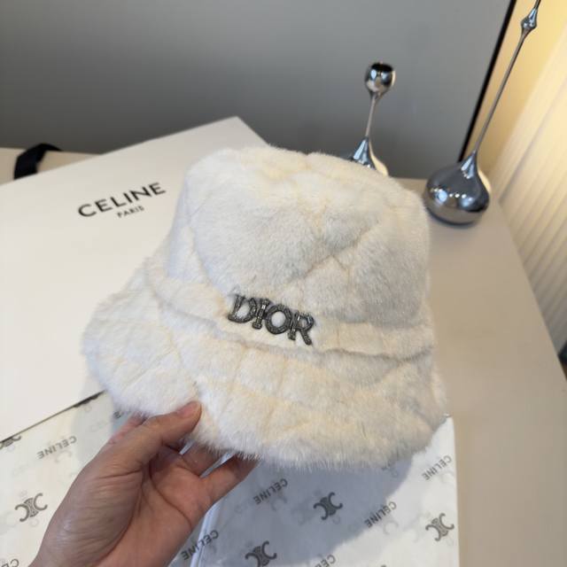 Dior's new suede fisherman's hat, fleece-lined with ear flaps, head circumferenc