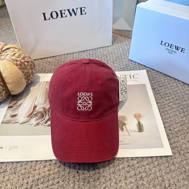 Loewe's new embroidered baseball cap, available in stores simultaneously. A high