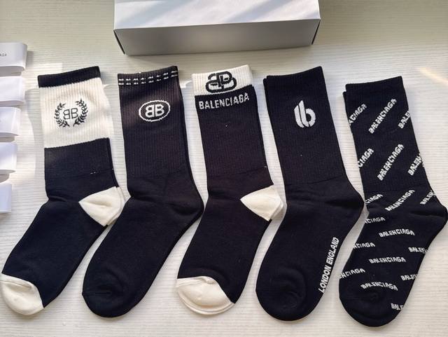 Special Offer: Balenciaga Women's Knee-High Socks (5 pairs per box). Made of pu