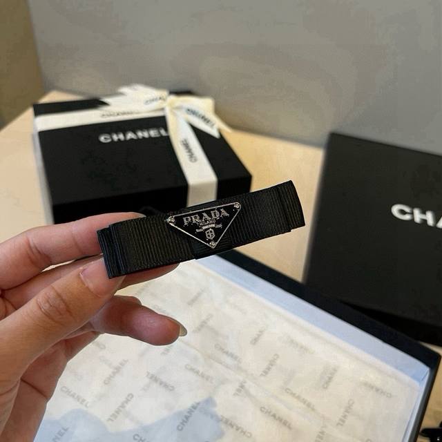 Single Prada hair clip DDD