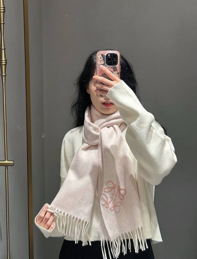 Loewe's latest and hottest 2025 scarf, a double-sided wool and cashmere scarf ad