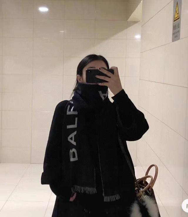 This Balenciaga classic monogram double-sided cashmere scarf in grey and black