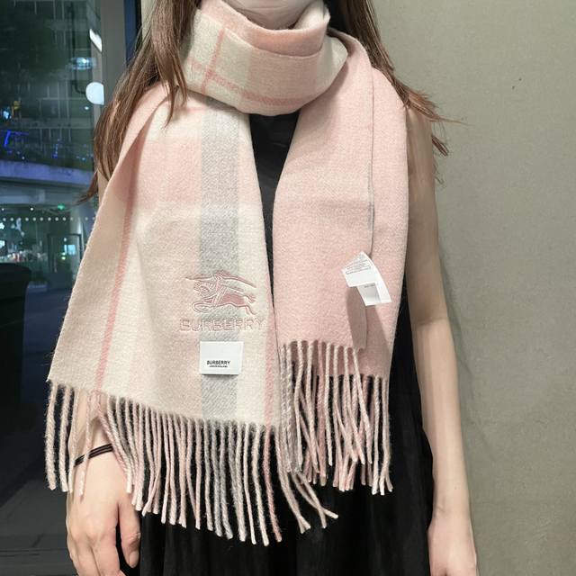 This Burberry double-sided striped lamb wool scarf is a recent find from a UK b