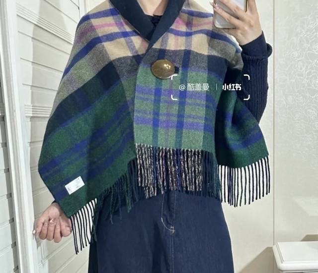 Vivienne Westwood's versatile shawl/scarf is finally here! This original Vivien