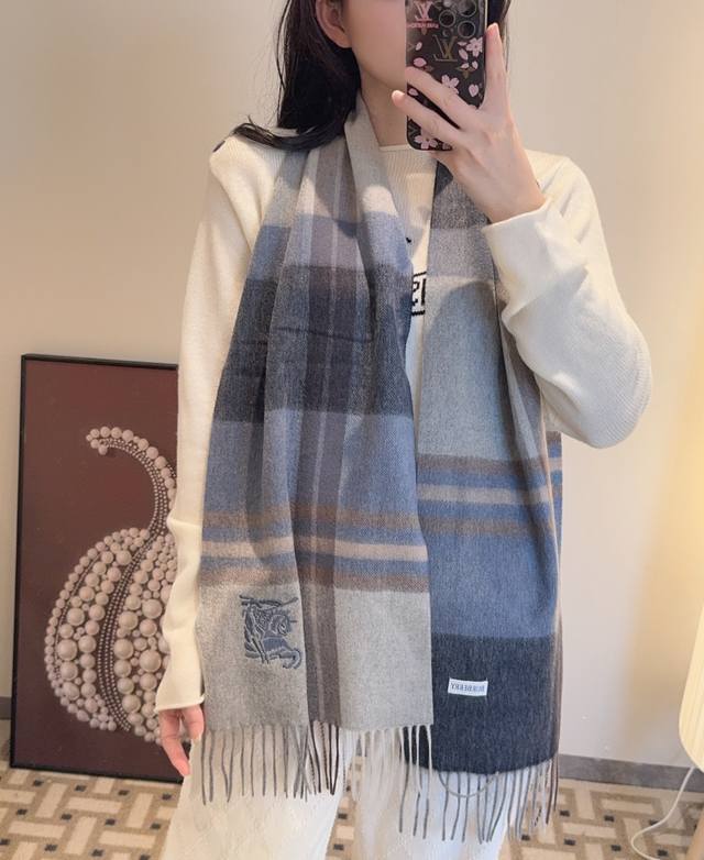 100% cashmere, stunning! Beautiful whether draped over your shoulders or wrappe