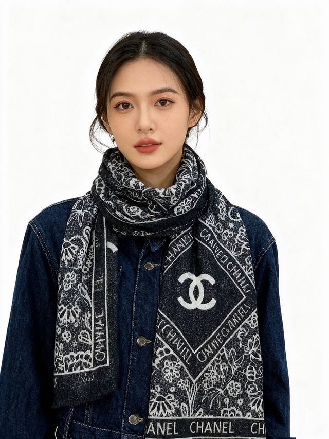 This shimmering Chanel cashmere scarf is a new arrival at Chanel boutiques and