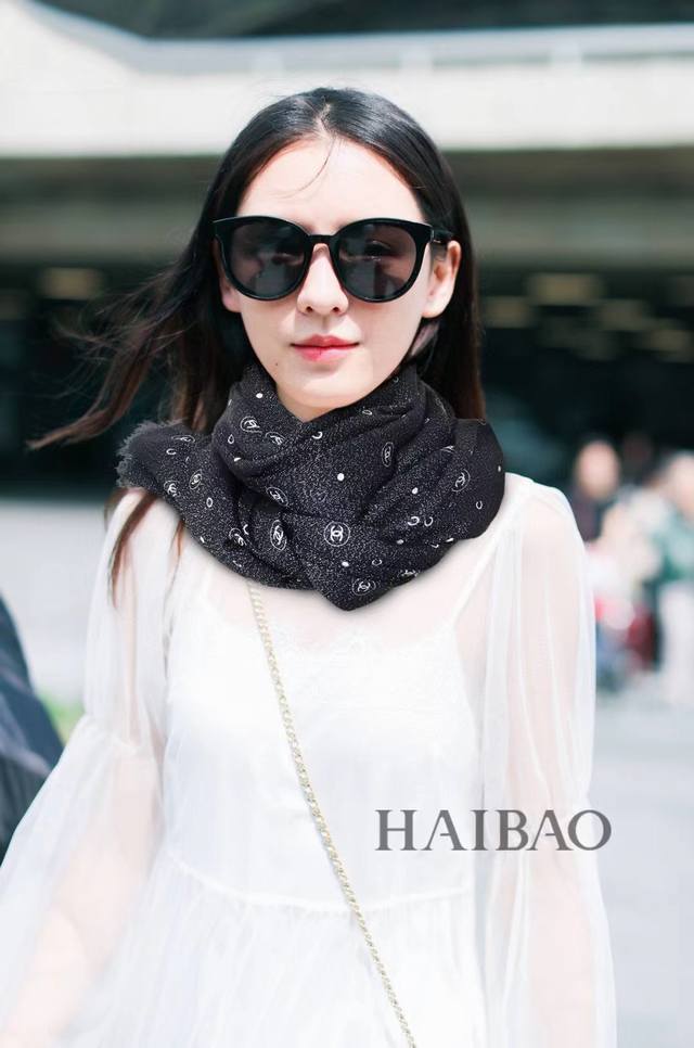 This new, luminous scarf is stunning! Made with premium silver cashmere thread