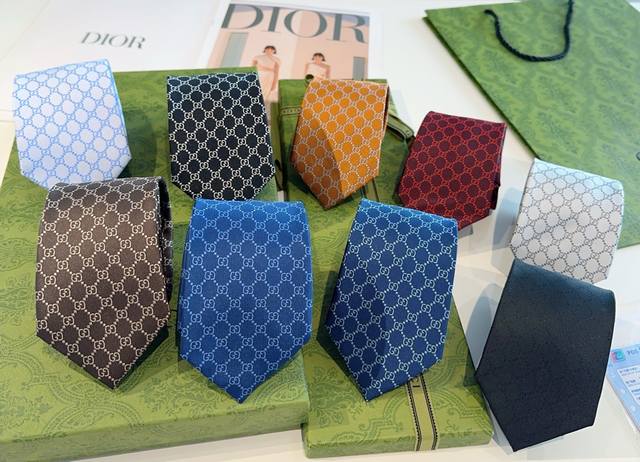 New G-brand men's tie with G logo print. A rare find, this tie features the cla