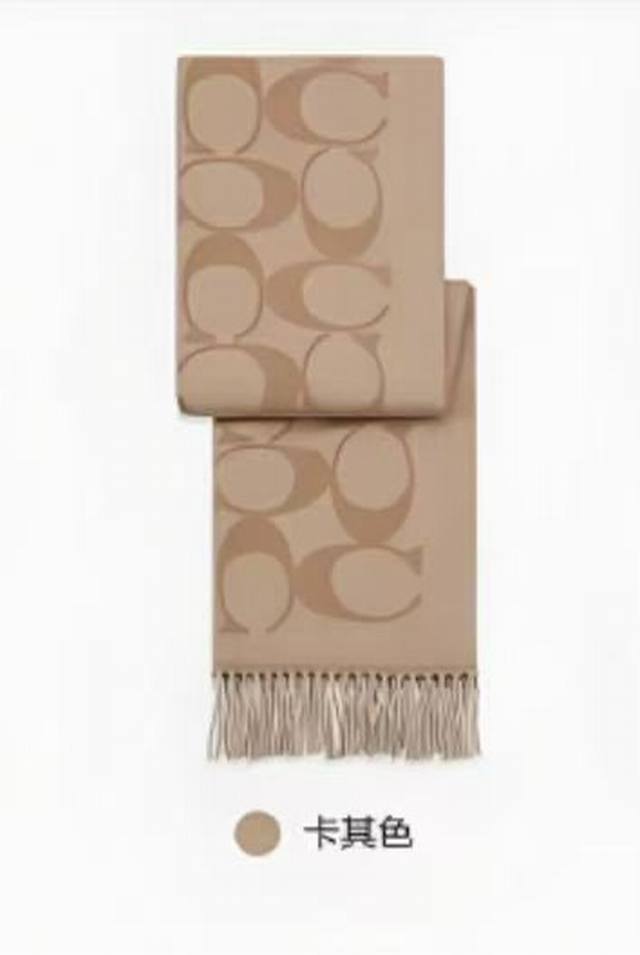 Coach. This high-quality Coach classic C logo reversible shawl is absolutely go