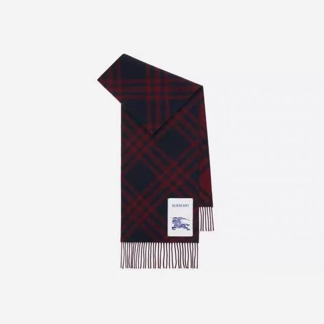 B Home. This Burberry cashmere and wool blend scarf exudes understated luxury wi