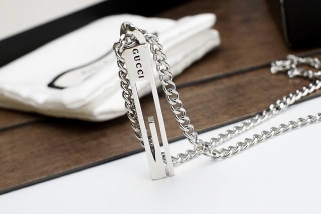 Gucci Couple G-Shaped Vertical Pendant Necklace, crafted from Gucci's "Love Wit