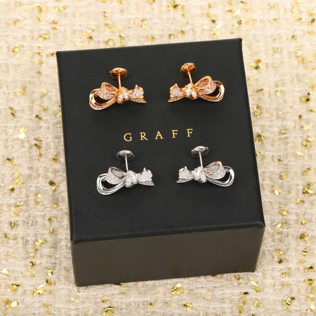 206744 We produce bow stud earrings, custom-made with genuine gold and diamonds.