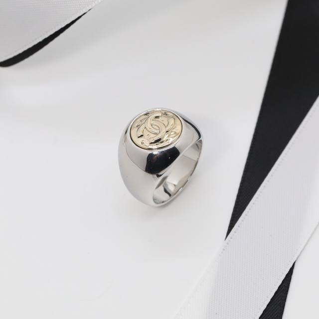 Ch Nel Ring: A two-tone gold-plated embossed women's closed ring available in si