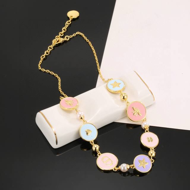 Dior Multi-Element Necklace and Bracelet (DDD) This bracelet uses vintage gold a