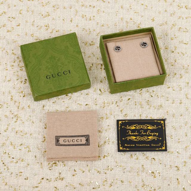 204933 We offer interlocking double G sterling silver earrings. Original price p