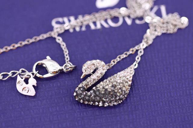 Swarovski Black Gradient Swan Necklace This elegant and charming white gold-plat