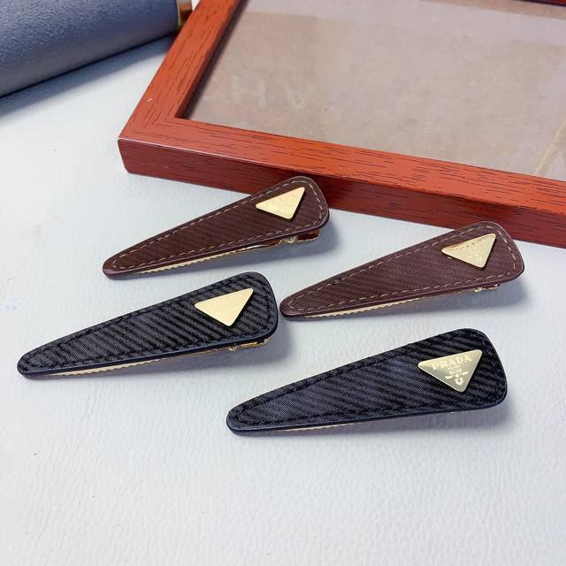 prada hair clips Prada hair clips Titanium steel logo clips, everyday exquisite