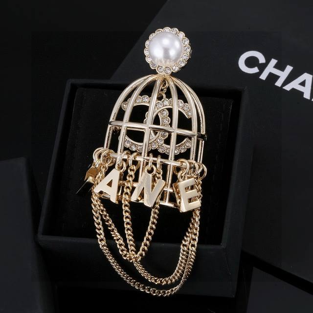 Chanel's new birdcage brooch design is absolutely stunning! It's a work of art,