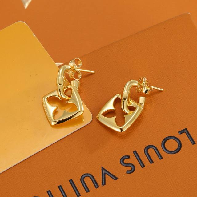 Lv gold stud earrings from Louis Vuitton bring a fashionable and interesting vis
