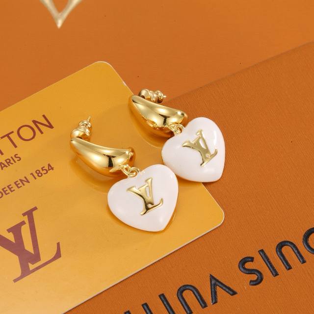 Exquisite Craftsmanship Louis Vuitton earrings, crafted with a dazzling Lv Twig
