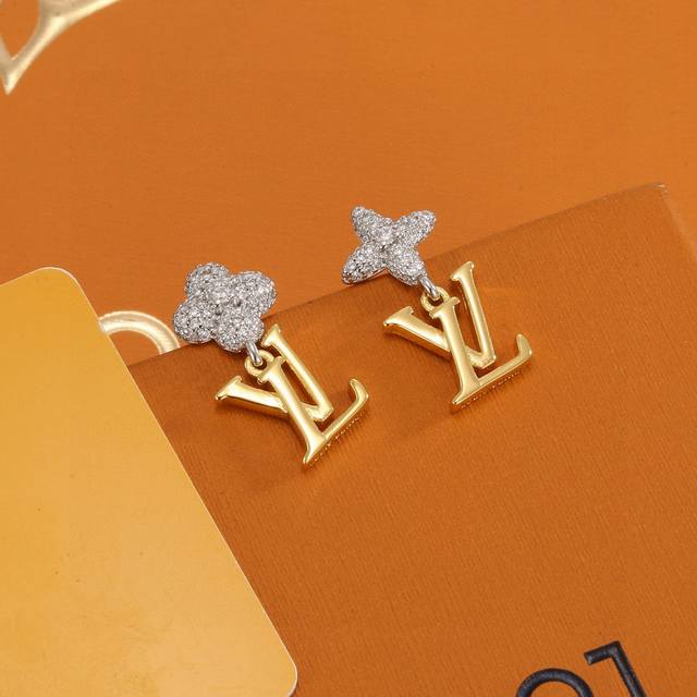 Exquisitely crafted Louis Vuitton earrings, embodying superb craftsmanship, use