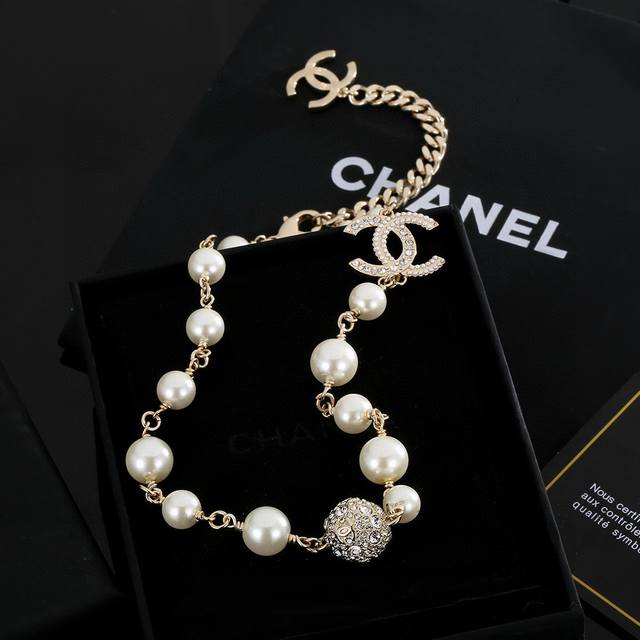 The quality is impeccable! Ch Nel New Pearl Necklace Irregularly adorned with gl