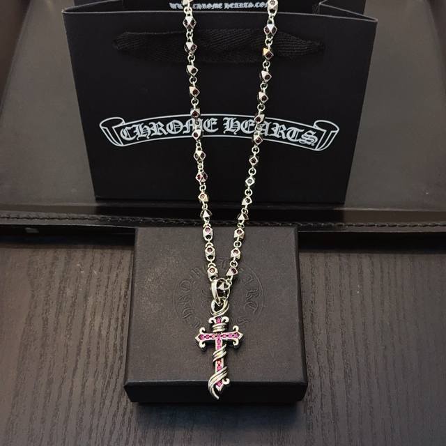 New boutique quality Chrome Hearts pink diamond necklace. The pink diamond cros