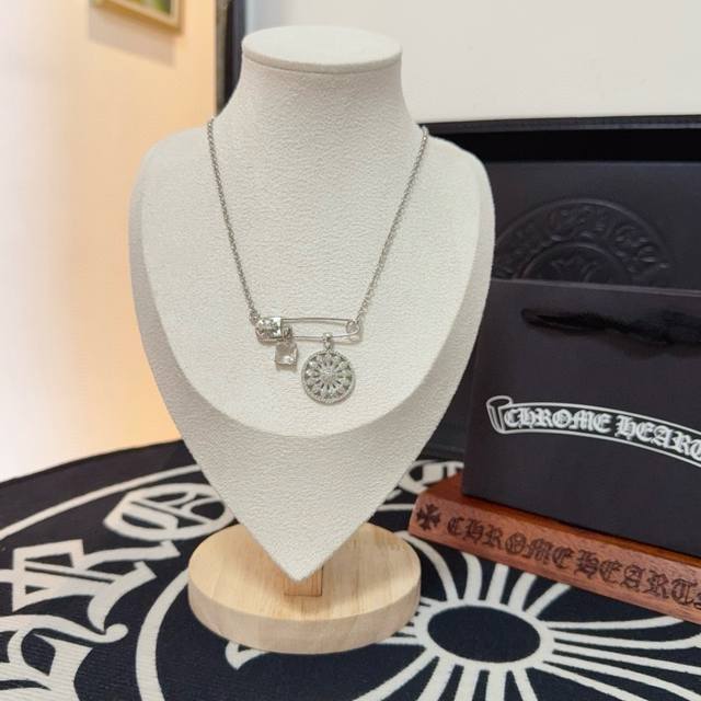 New boutique quality Chrome Hearts brooch with white diamonds and sunflower des